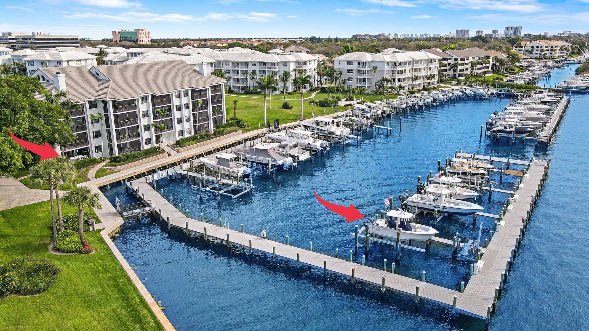 Rarely available, fully renovated 3 bed 2 bath end unit in Bay Colony with unobstructed intracoastal marina views !