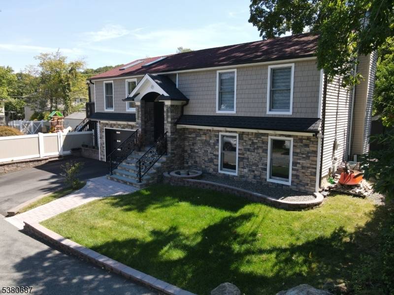 Nestled in the desirable White Meadow Lake community, this beautifully renovated 2023 residence is truly a hidden gem.