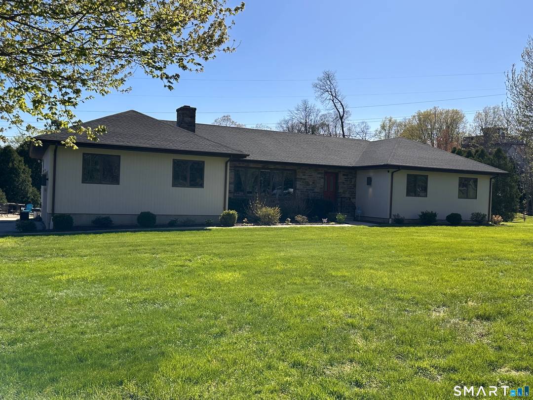 This refreshed custom ranch at 36 Marks Court offers easy one floor living with fantastic versatility.
