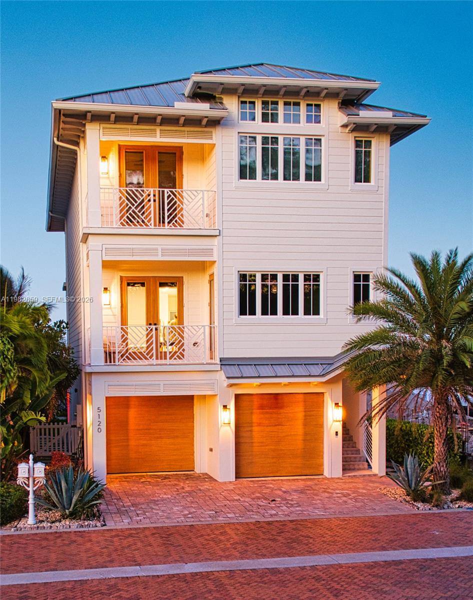 Experience modern coastal luxury in this stunning 2022 custom built oceanfront retreat located in the exclusive gated community of Watersong on South Hutchinson Island.