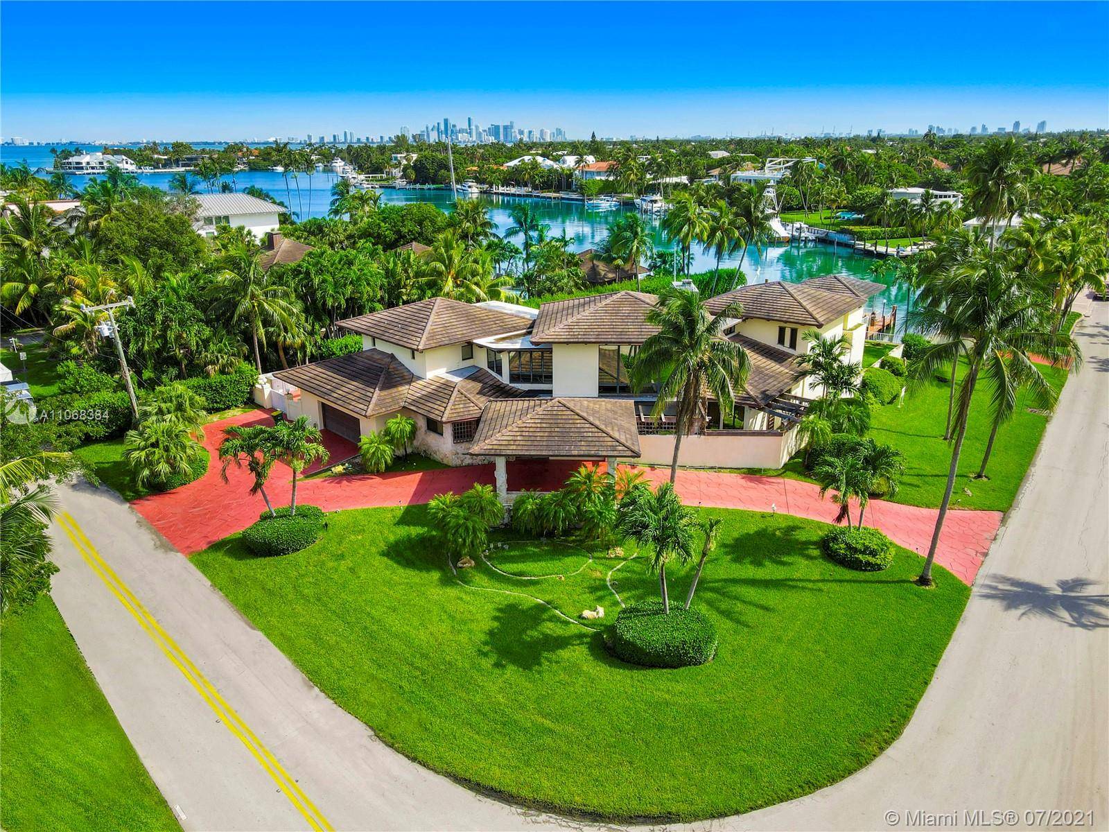 MASSIVE KEY BISCAYNE CORNER LOT DEVELOPMENT OPPORTUNITY ON 3 4 ACRE LOT WITH 113 FT OF WATERFRONTAGE ON EXCLUSIVE MASHTA ISLAND !