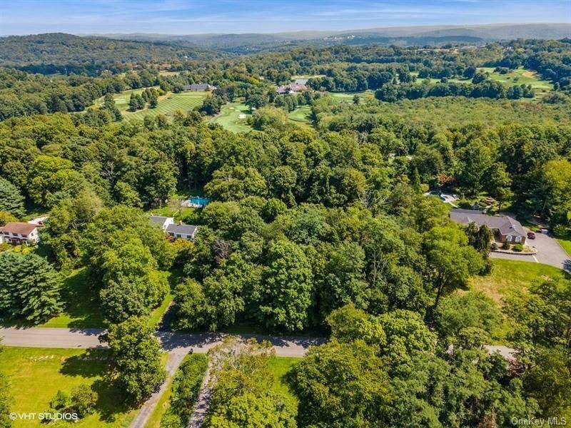 BUILD YOUR CUSTOM HOME ON THIS UNIQUE LOT IN THIS WELL SOUGHT AFTER COMMUNITY !