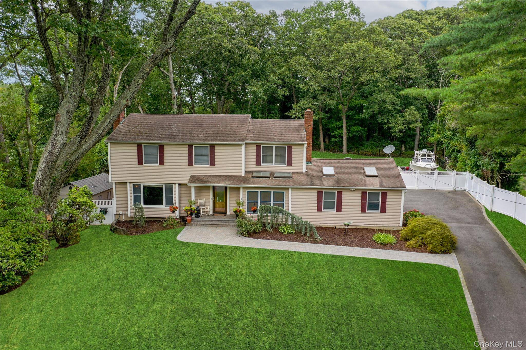 This Majestic Colonial With Water Views And Access To The Nissequogue River Features Four Large Bedrooms Primary With Ensuite Formal Livingroom With Wood Burning Fireplace Family Room With Fire Place ...
