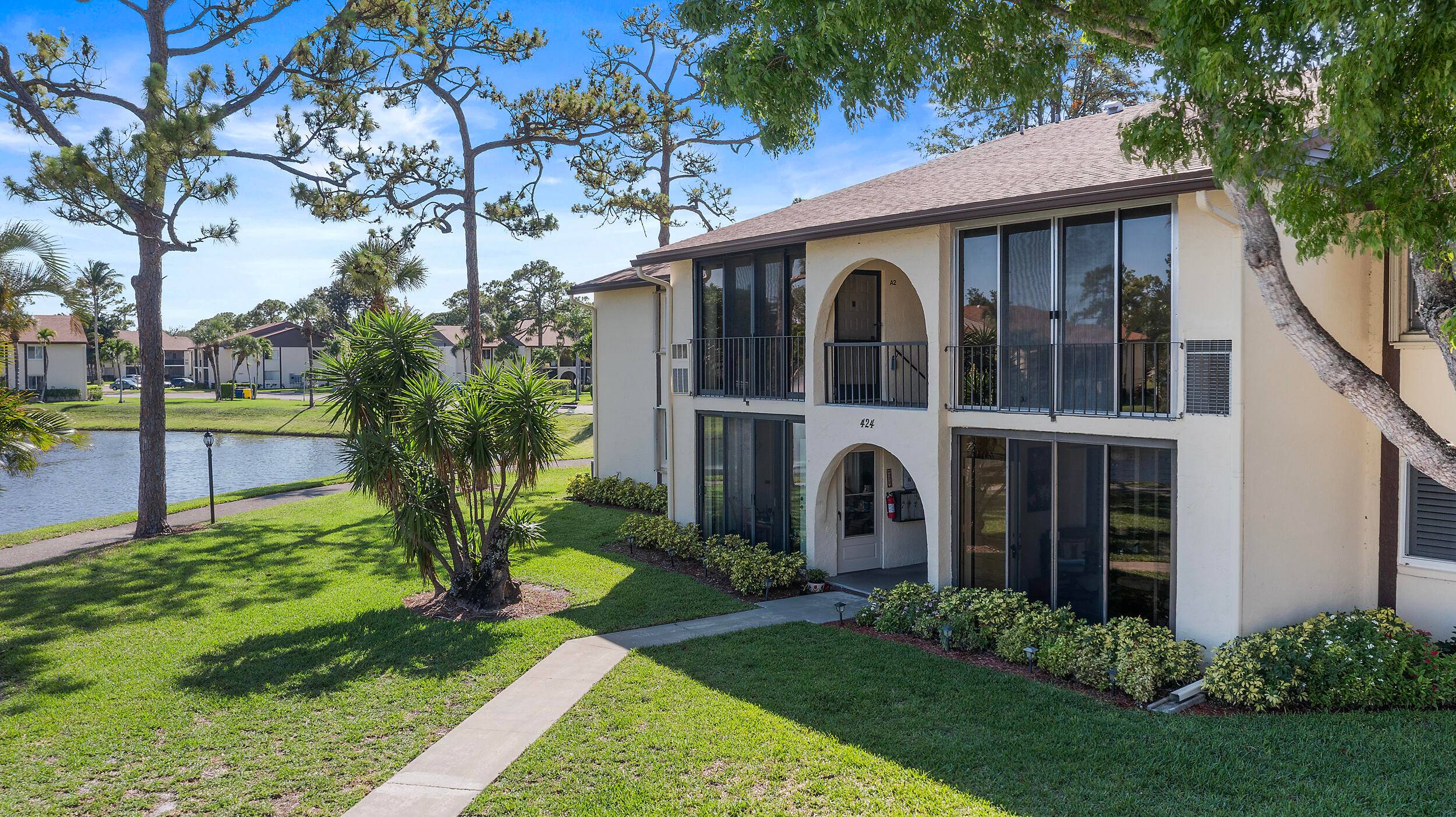 Turn Key Corner Condo in 55 Community Lake Views Smart Tech Upgrades !