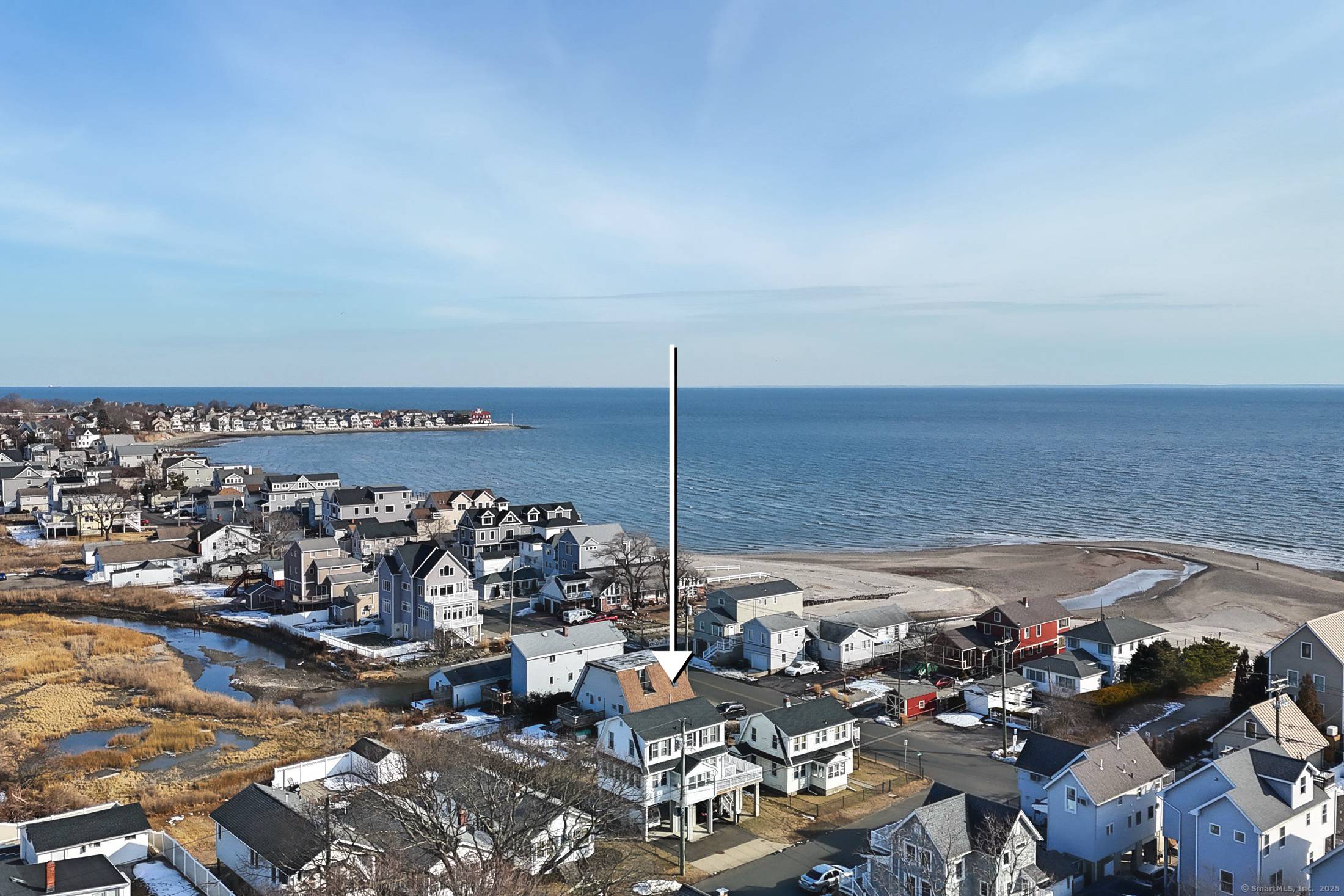 Don't miss this rare opportunity to live across from the water !