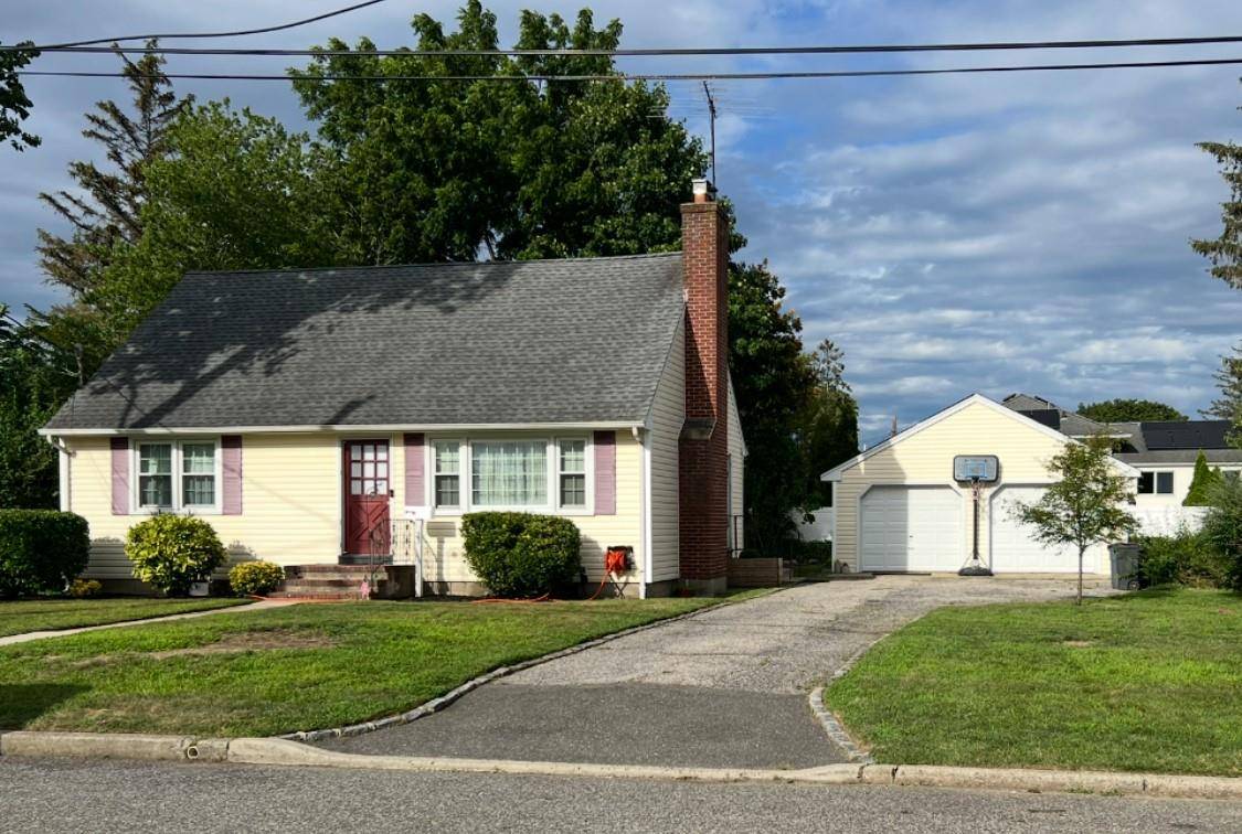 Spacious Cape Style Home with Great Potential !