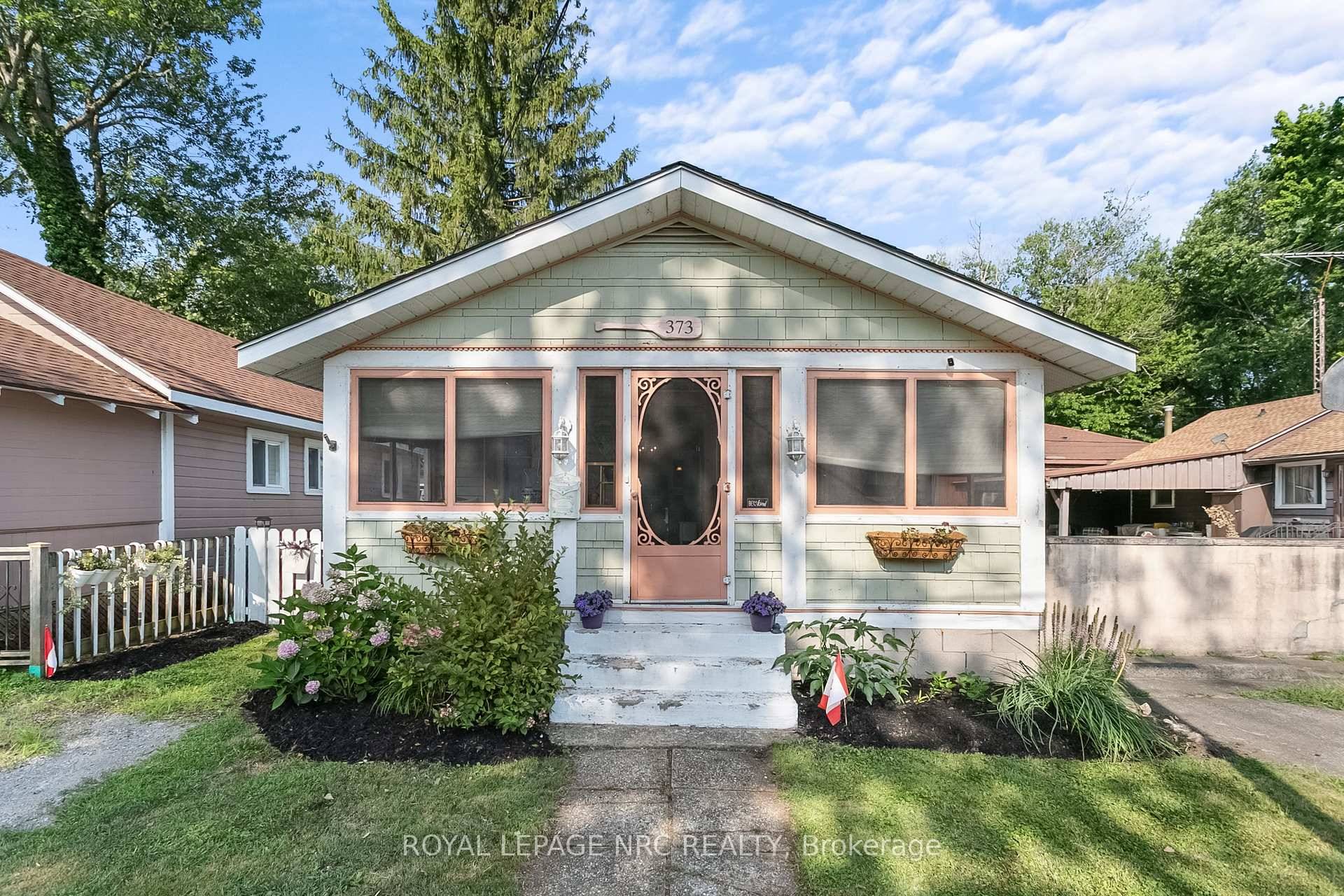 Step into the charm of Crystal Beach living with this quaint year round cottage, brimming with character and modern comforts.