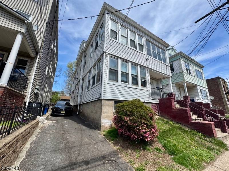 Recently Renovated Three Family Home Vacant Move in Condition Located near Vailsburg Park, Garden State Parkway Newark Downtown Large Home Rear Yard Two car Gargar
