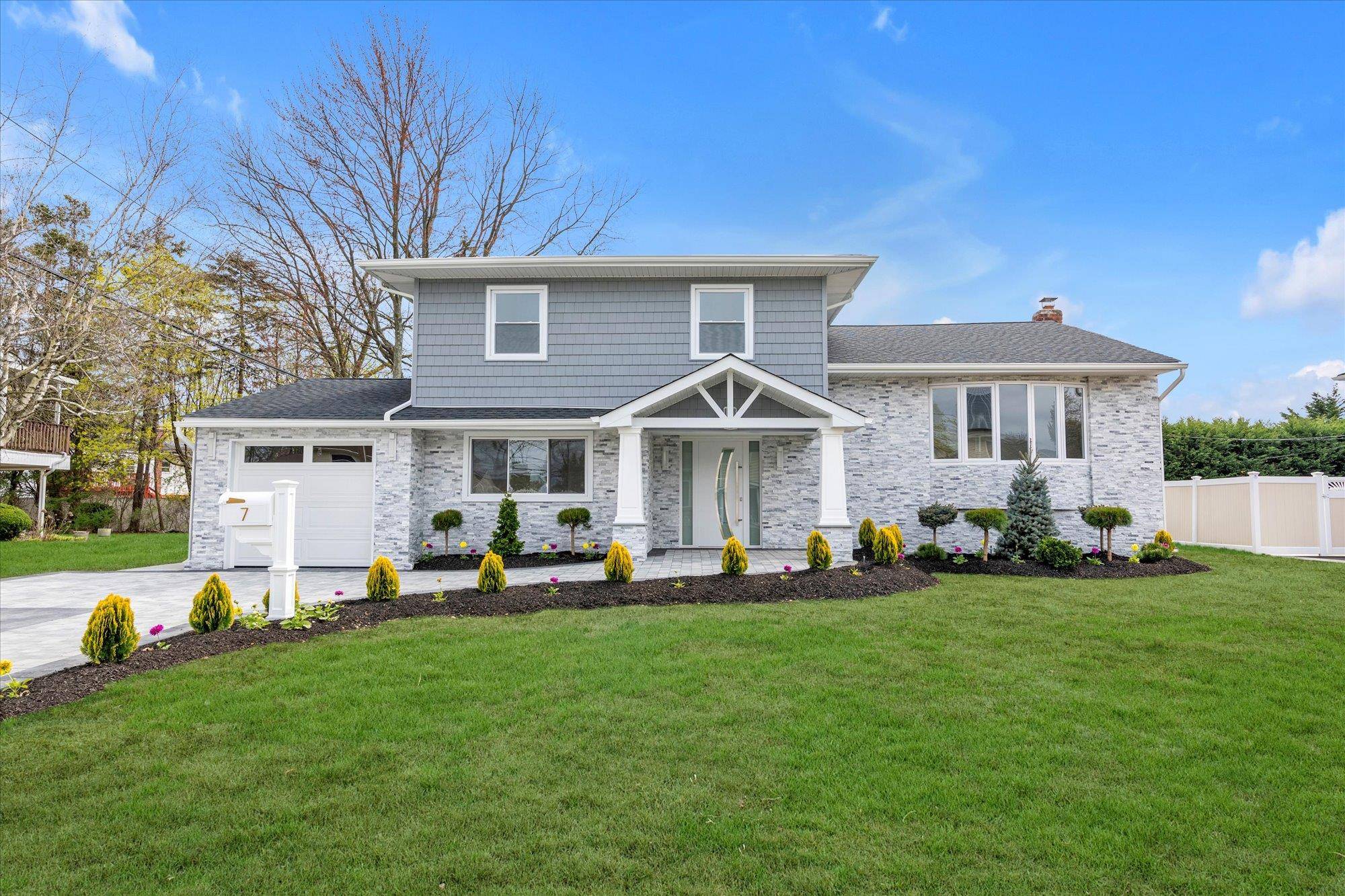 Welcome to this beautifully designed, expanded split level home, featuring 4 spacious bedrooms and 3 beautifully appointed bathrooms.