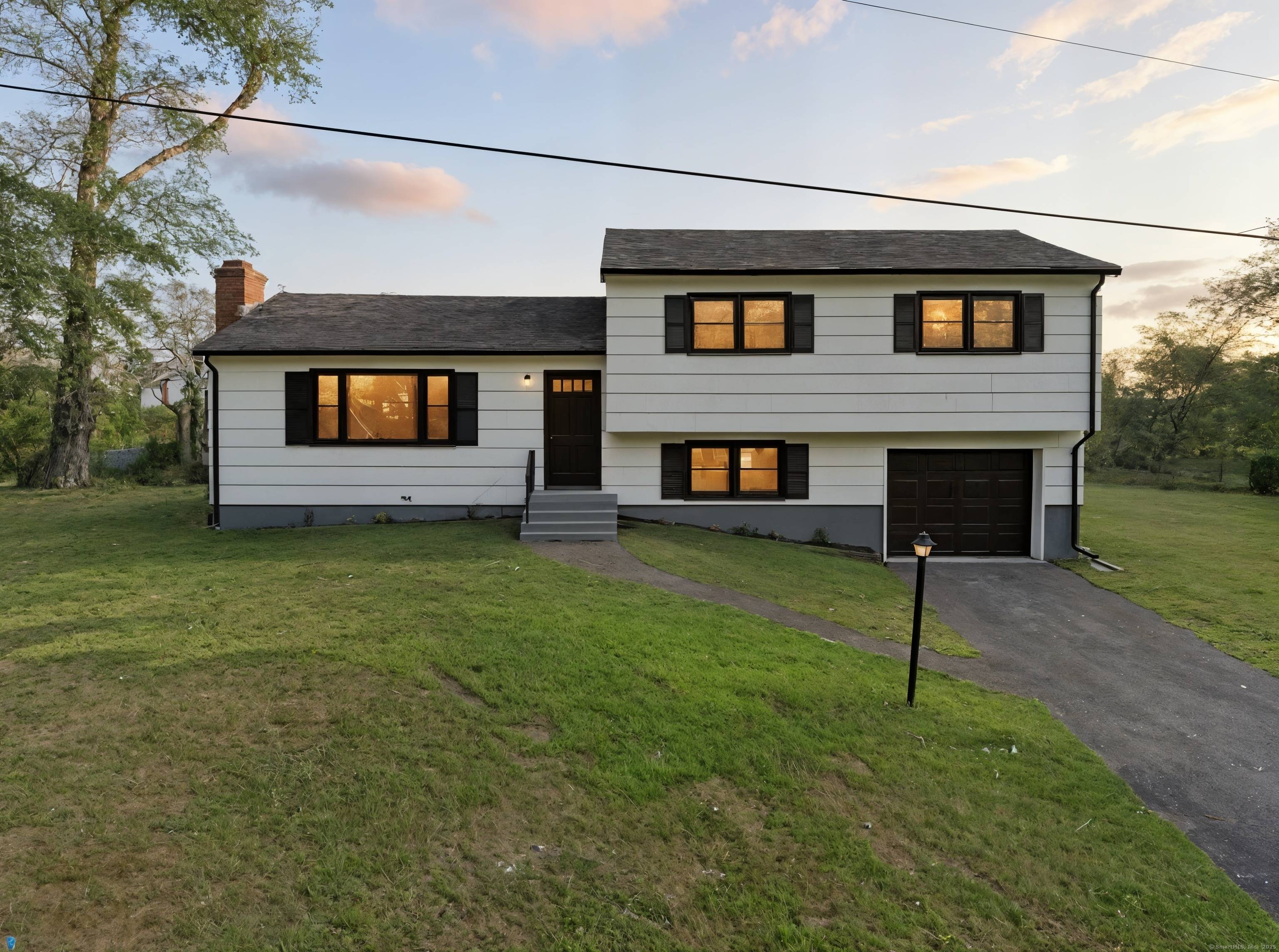 Step inside this beautifully renovated multi level home tucked in a peaceful, tree lined neighborhood.