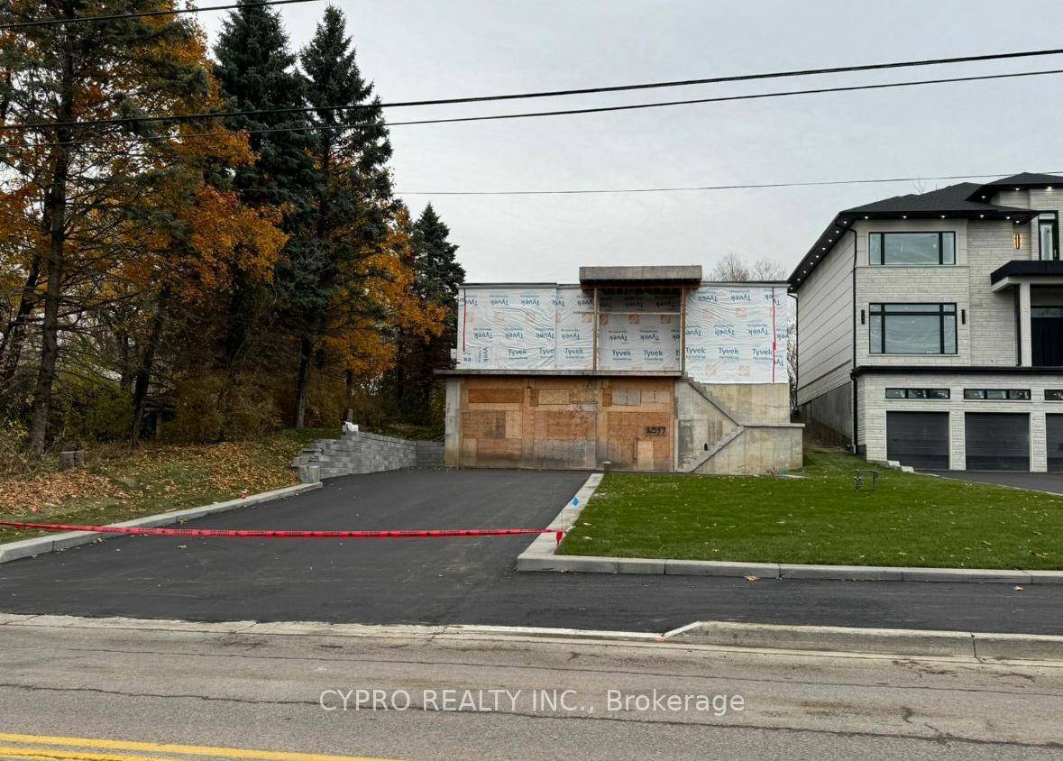 Property Under Construction with Approved Building Permit A True Custom Home.
