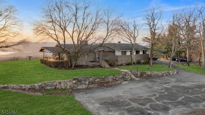 A one of a kind mid century modern with an unmistakable Hollywood Hills sensibility, set high along the ridgeline of the Ramapo Mountains at the end of a nearly mile ...