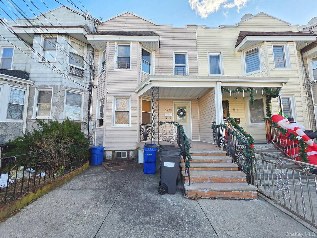 Welcome to this well maintained two family residence in the desirable Glendale neighborhood of Queens.