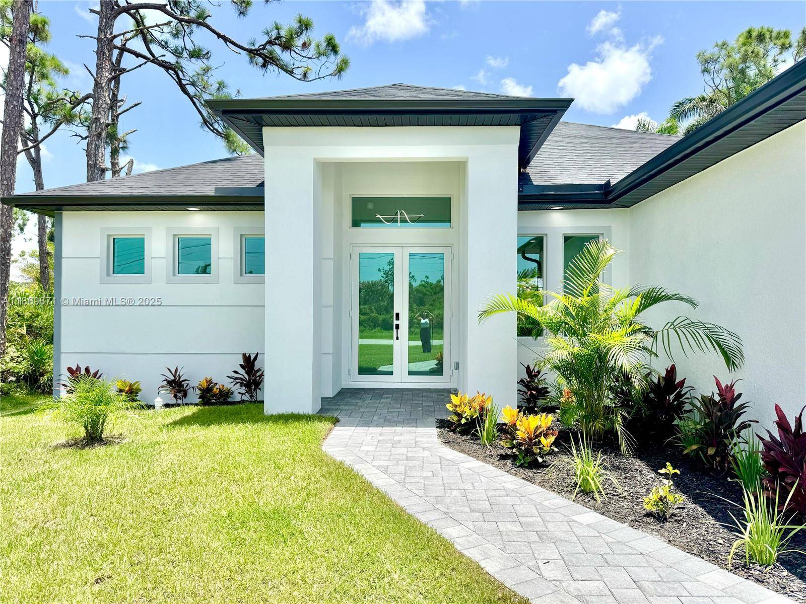 Discover this brand new modern home offering an elegant living space in the heart of Rotonda.