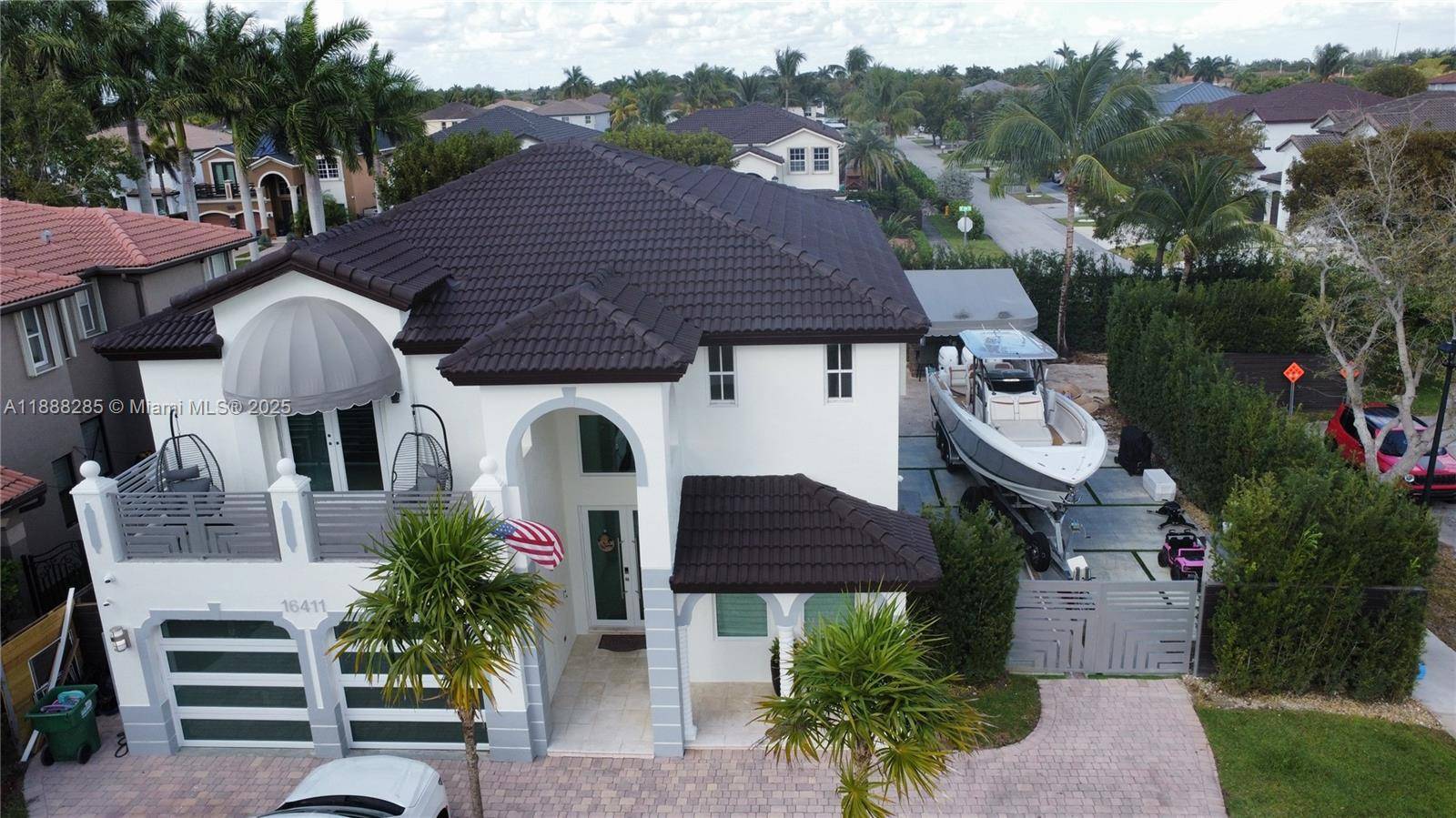Fully remodeled corner home, 5 3 with spacious bedrooms, travertine marble floor, a beautiful staircase, high ceilings that let in natural light and give a modern touch to the house.