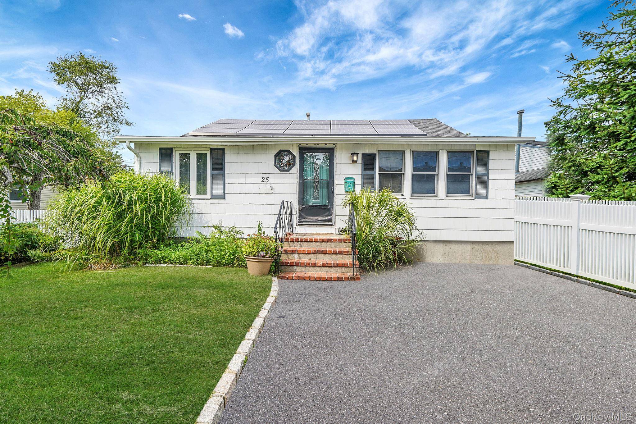 This 2 bedroom, 1 bath ranch features hardwood floors throughout and a spacious eat in kitchen.