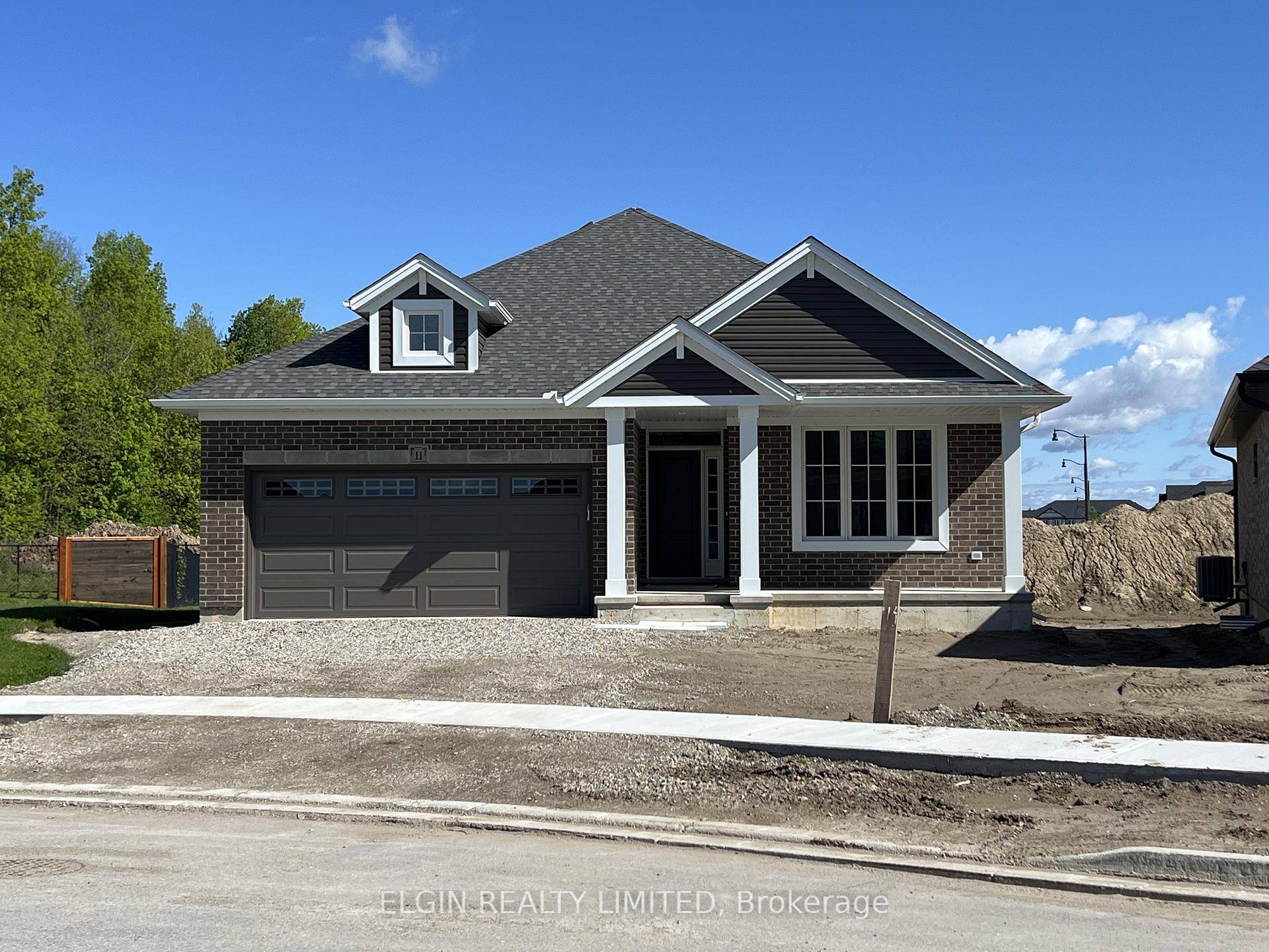 Move In Ready ! The 'Sharpton' bungalow by Hayhoe Homes offers 2 bedrooms, 2 bathrooms, including a primary ensuite with custom tile shower and double sinks.