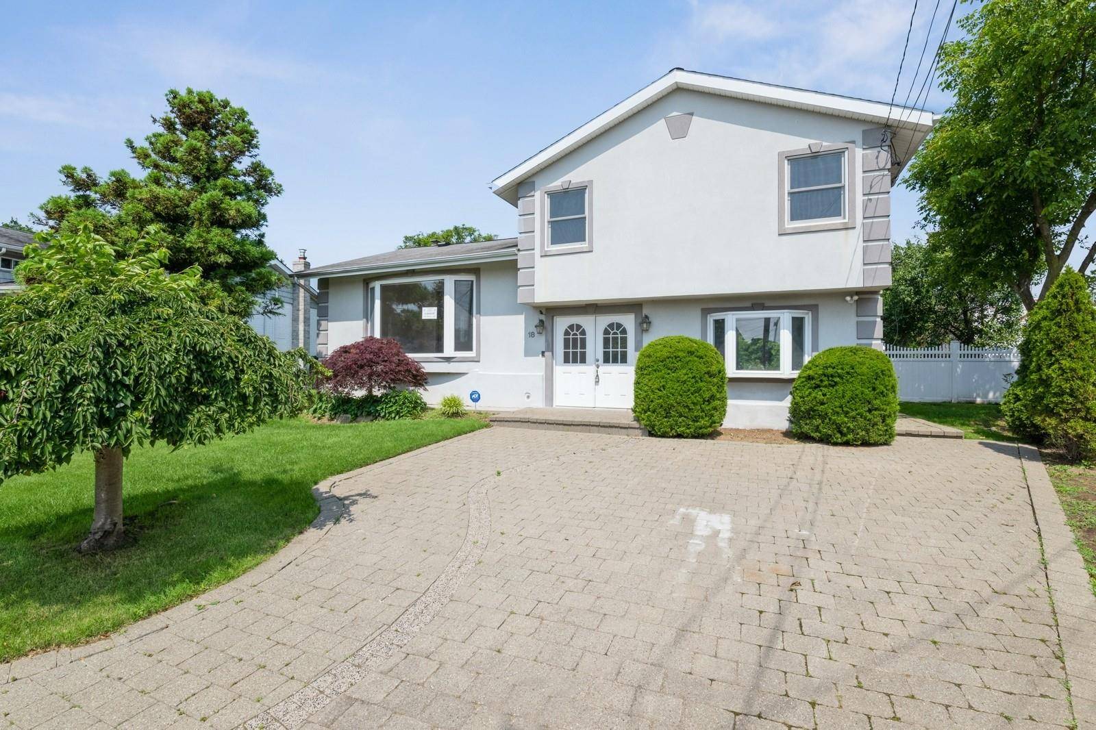 New To Market Modern Waterfront Split Level Home On Canal.