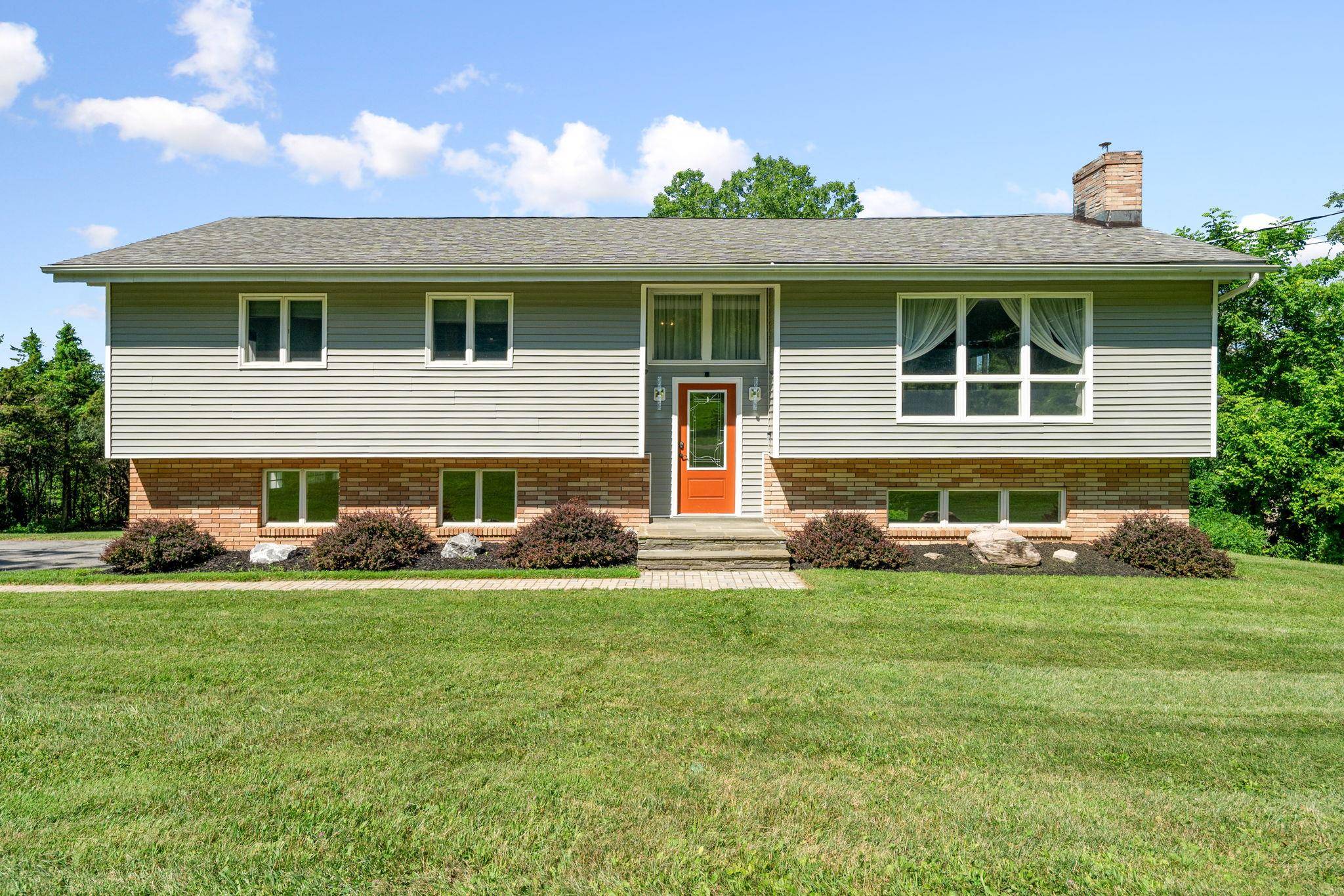 Welcome to 29 Cedar Lane, a beautifully maintained home nestled in the heart of Poughquag's peaceful countryside.