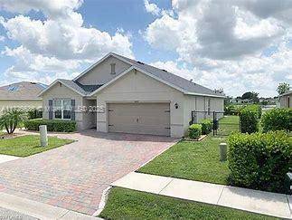 DRASTIC REDUCTION MOTIVATED SELLER BRING ALL REASONABLE OFFERS Stunning 4 bedroom, 2 bath lake front home tile floors, open kitchen with granite tops, 2 car garage with mini split A ...