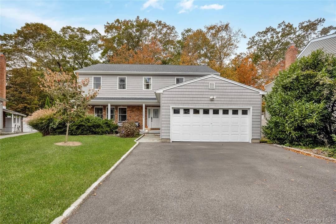 Welcome to this charming Colonial nestled in a secluded cul de sac within the highly sought after Wantagh School District.