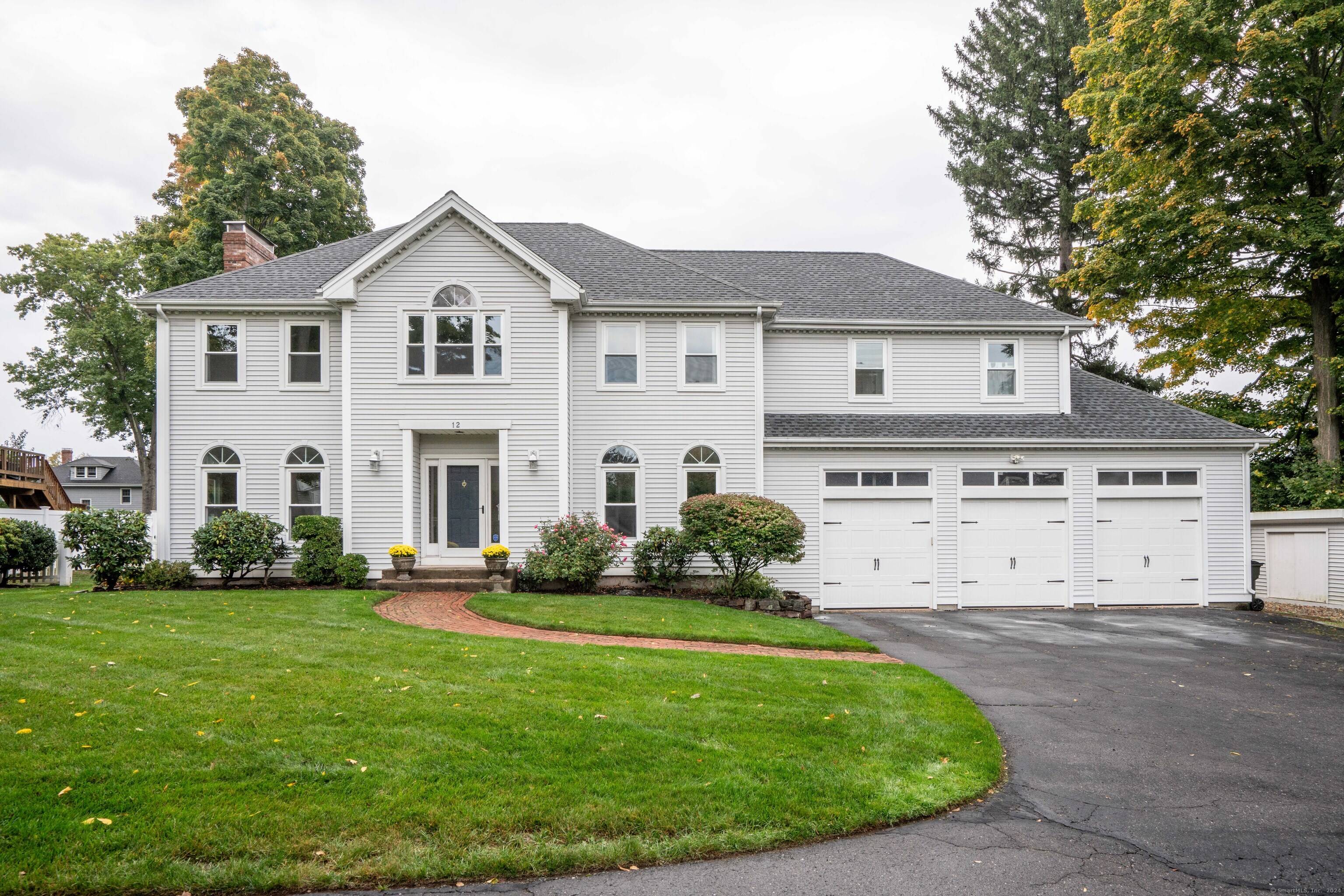 Nestled on a quiet cul de sac in the sought after town of West Hartford, this stunning home exudes timeless elegance with spacious interiors and an unbeatable location.
