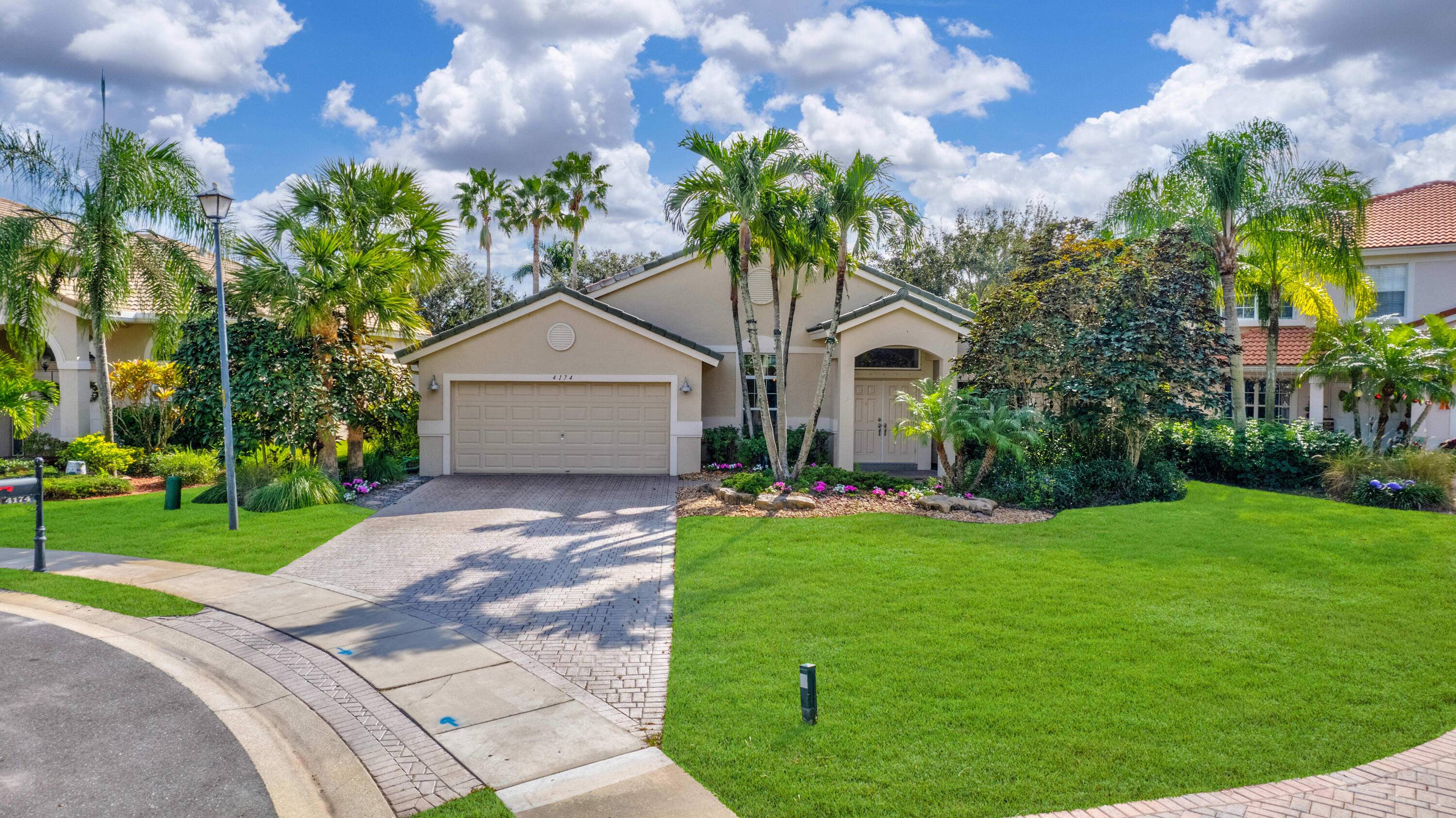 Welcome to your dream home in the prestigious gated community of Isles at Wellington !