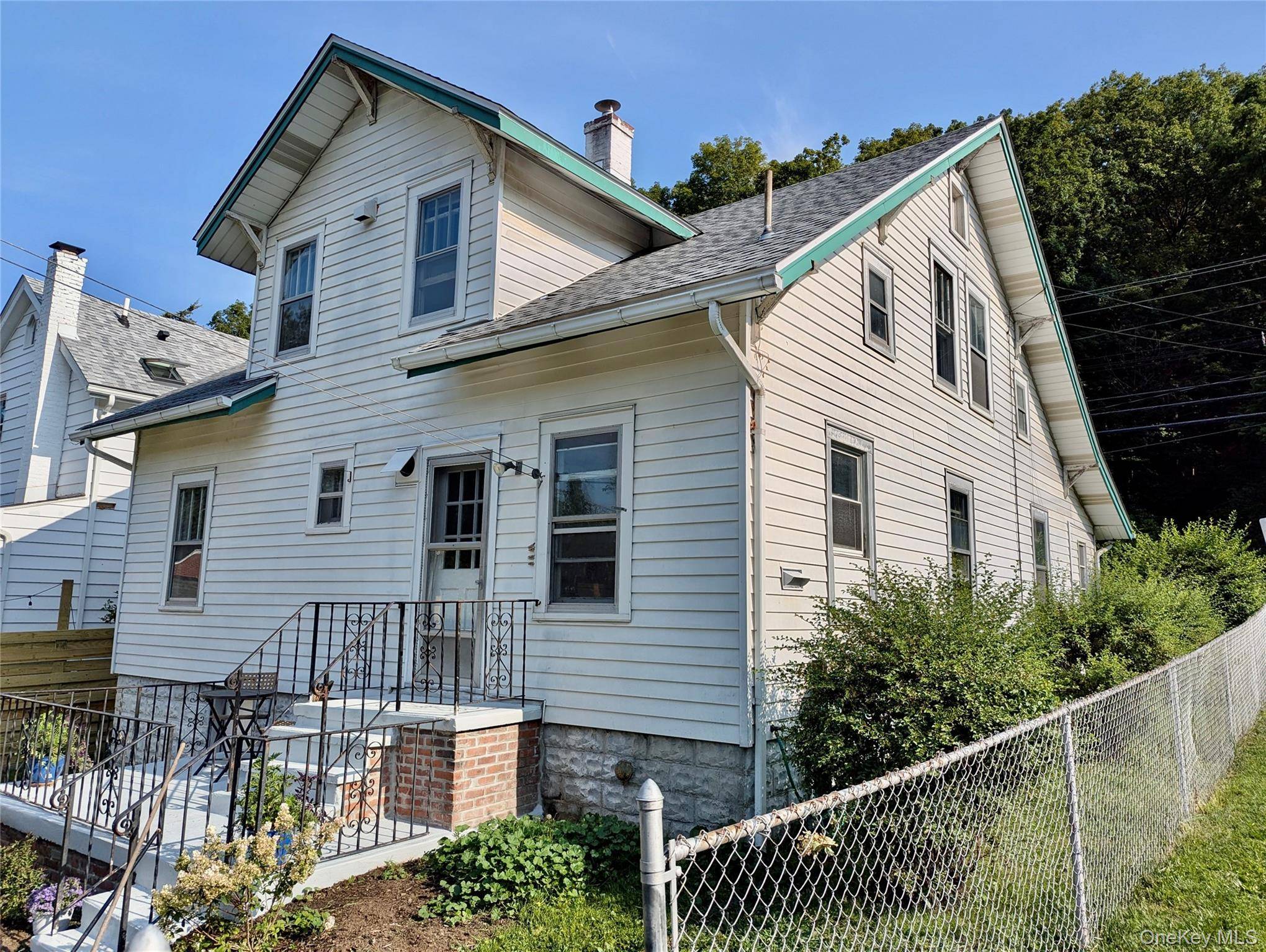 An exciting opportunity to live in a beautifully arranged mother daughter apartment that offers incredible options for creative living.