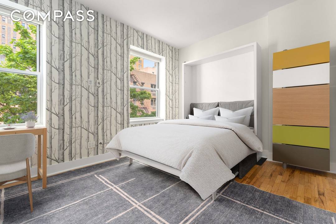 Located on one of Chelsea s most picturesque tree lined brownstone blocks, Residence 4R at 421 West 22nd Street is a thoughtfully renovated loft like studio that blends classic prewar ...