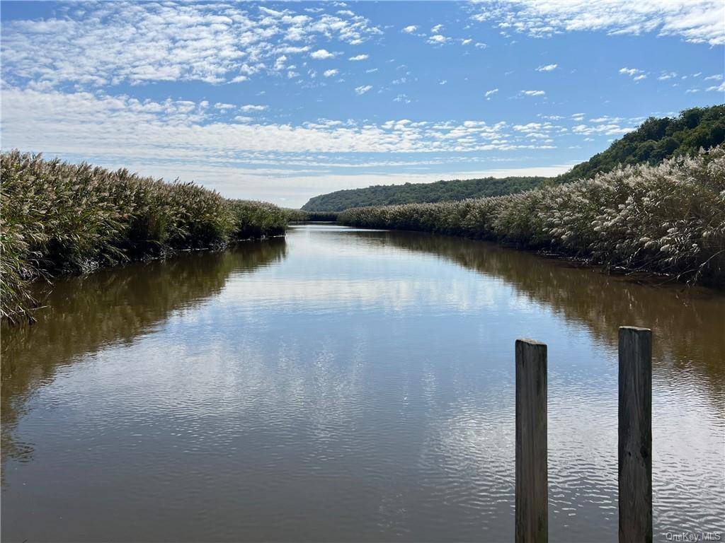 EDGE OF PARADISE Where else can you find a LUXURY SHORT TERM FURNISHED rental with private WATER ACCESS, panoramic river marsh views and a protected bird sanctuary, footsteps to exquisite ...