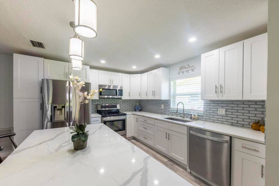 ''ONE OF A KIND'' Villa in Delray Beach with only a few homes that your backyard is a nature preserve named WAKODAHATCHEE WETLANDS.