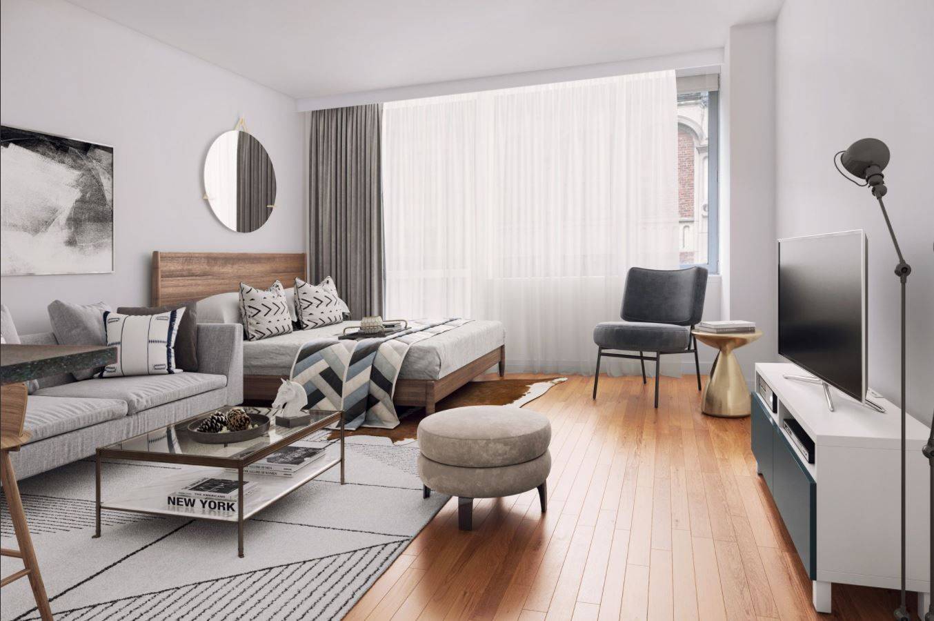 Oversized studio apartment featuring floor to ceiling windows, high ceilings, a gourmet kitchen with stainless steel appliances, honed concrete tile floors, granite countertops and an eating bar.