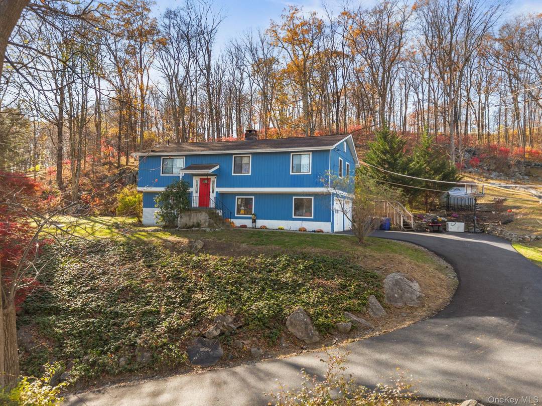 Raised Ranch with 3 Bedroom, 2 Full bath Home sits high above road with private back yard.
