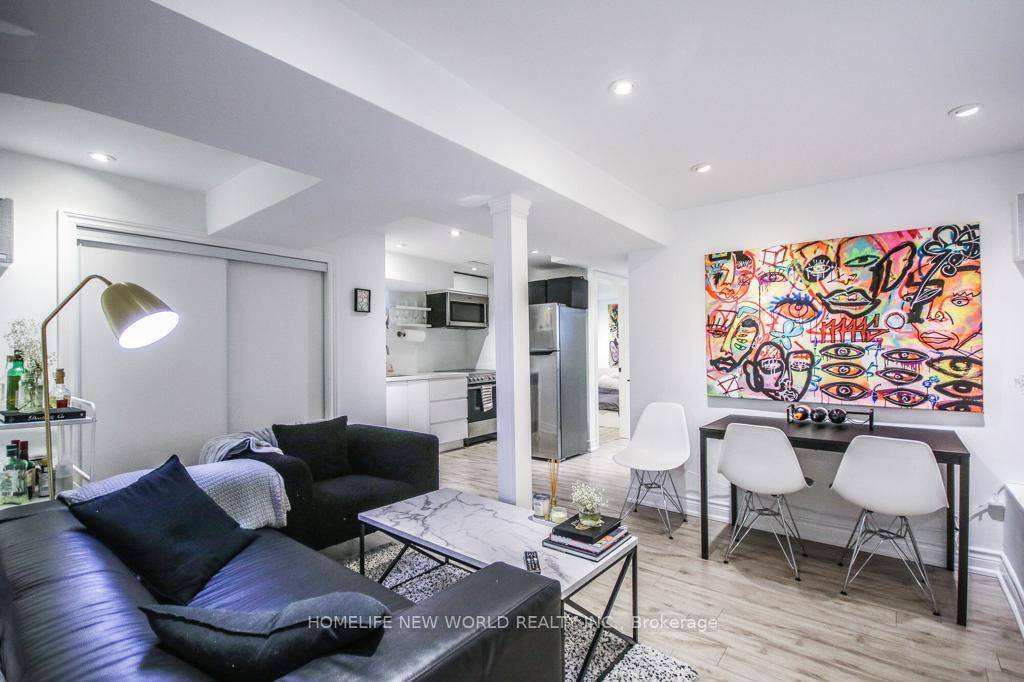 Welcome to this luxury 2 bedroom den Basement unit, nestled in the vibrant Wallace Emerson community !