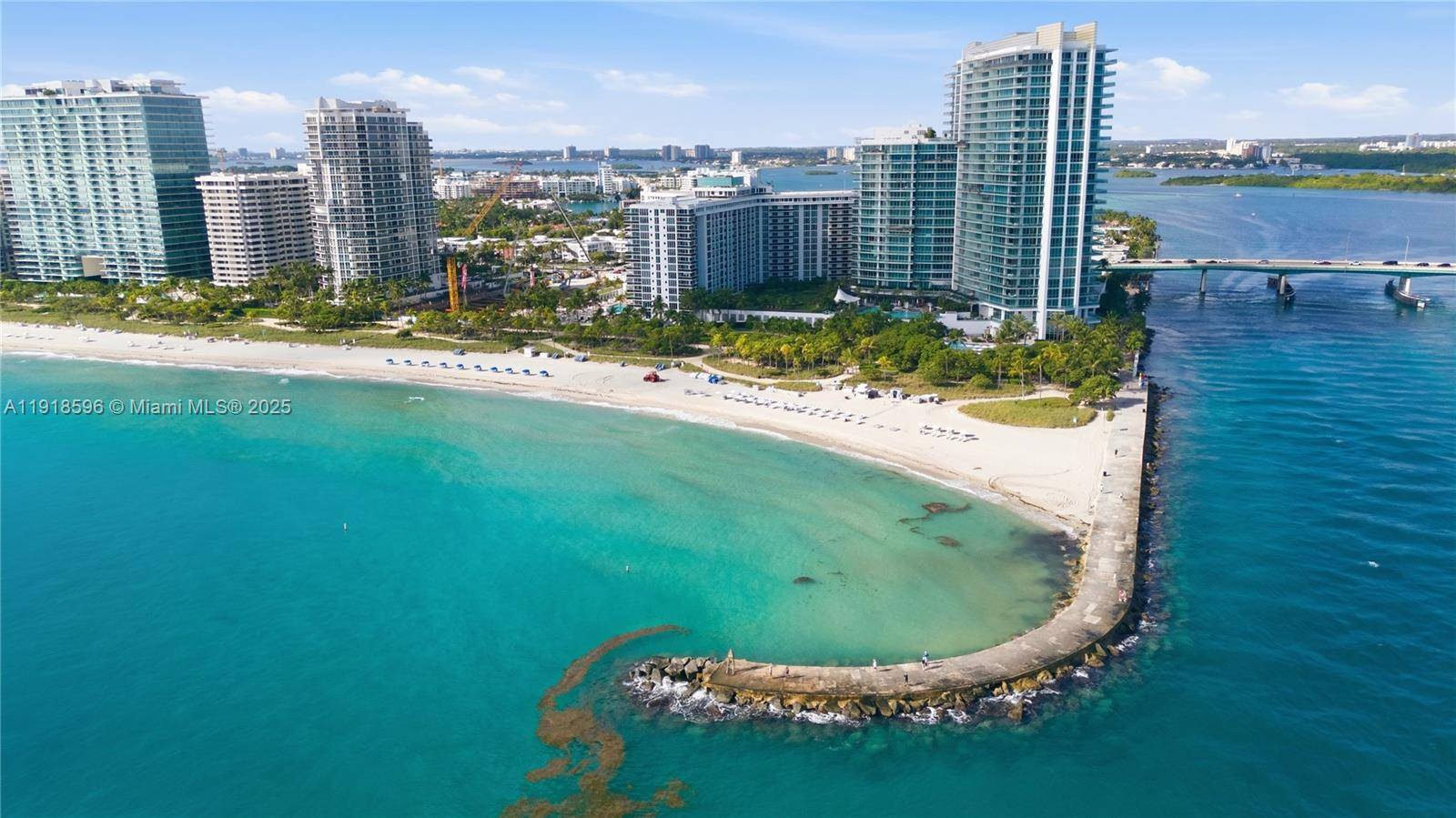 11th floor unit at Harbour House in Bal Harbour, offering natural light, open layout, updated finishes, and lateral ocean and Intracoastal views from a private balcony.