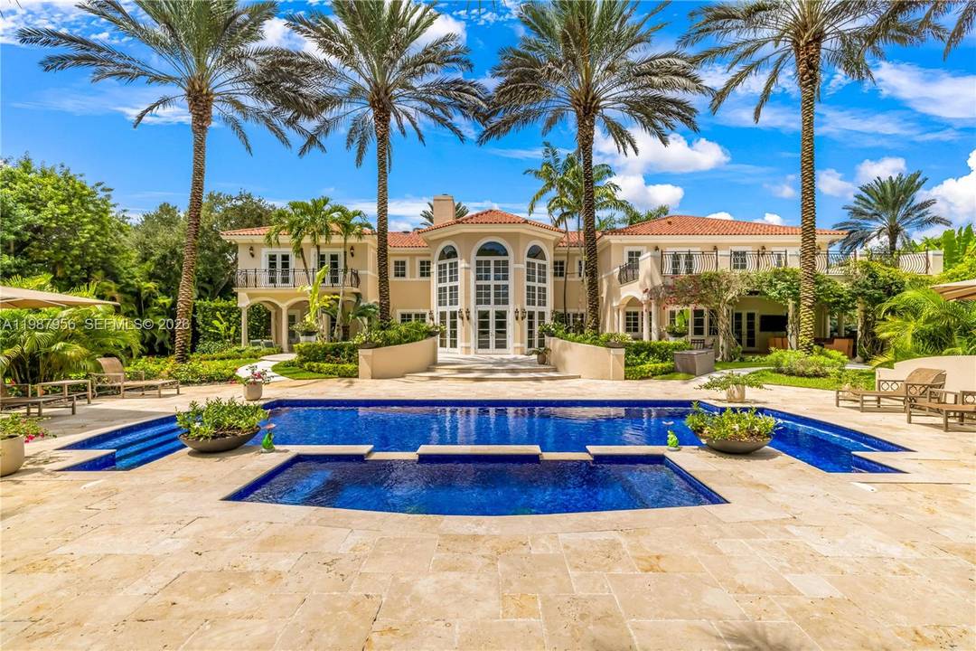 An architectural statement within the prestigious guard gated enclave of Snapper Creek Lakes, this extraordinary residence blends modern design with refined European influence.