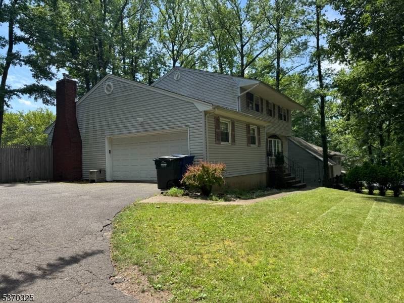 Nestled on a quiet dead end street in desirable Fanwood, NJ, this 4 bedroom, 4 bathroom single family home offers spacious living in a prime location.