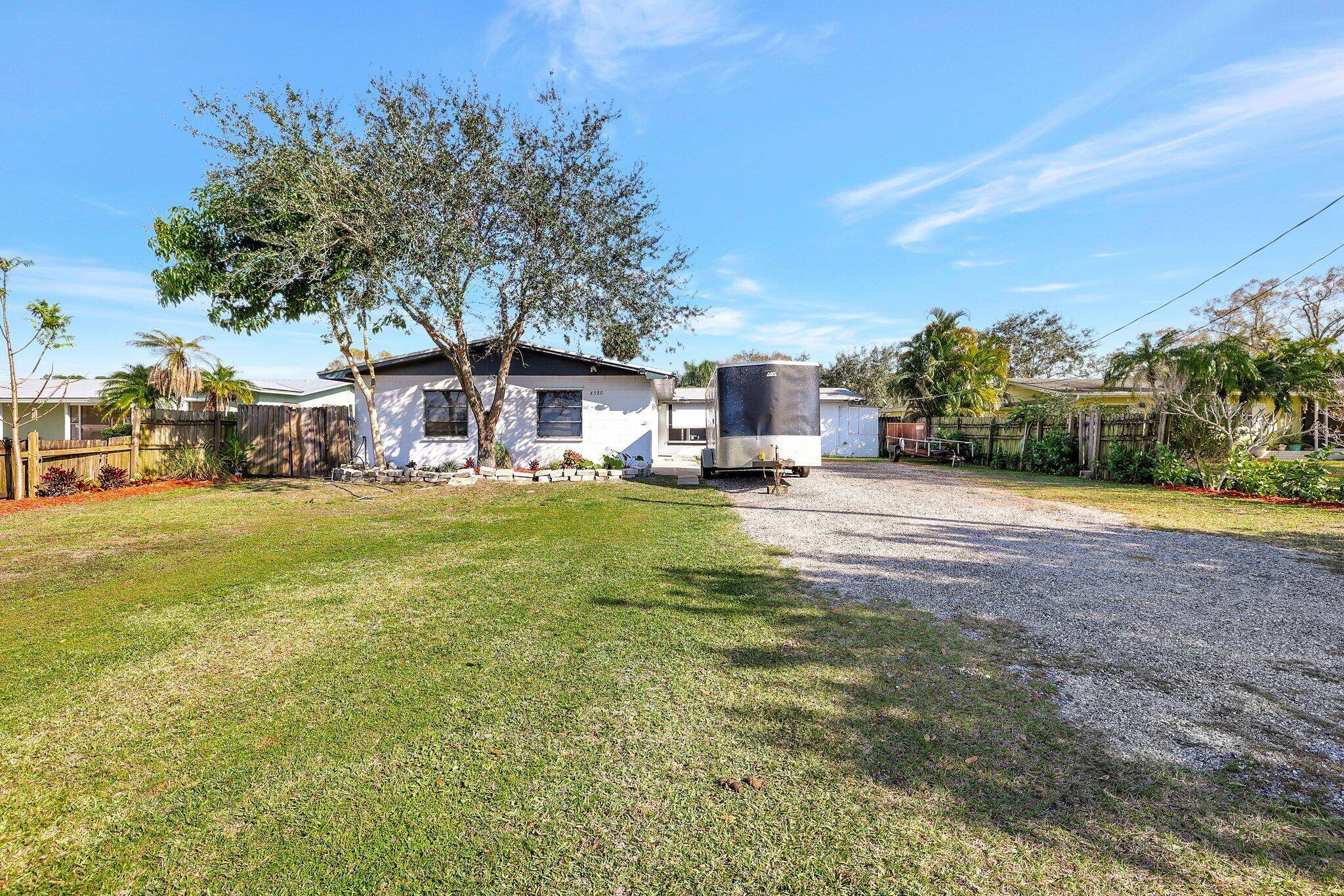 Solid 3 bedroom 2 bathroom huge 2 car garage concrete pool home located on a quiet street in White City.