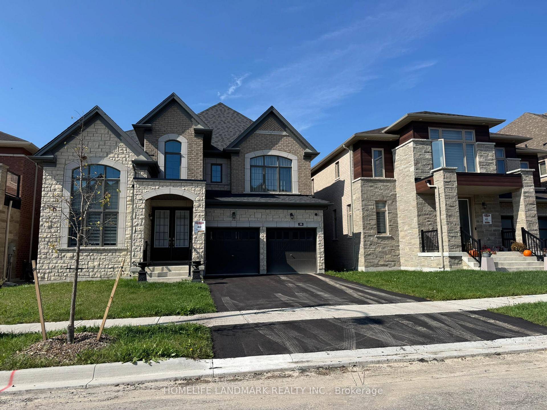 Two Year New Luxury 3 Garage Detached Back Onto Ravine.
