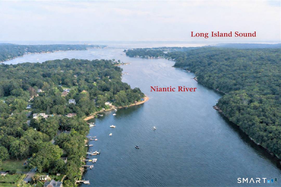 Rare direct waterfront retreat on the Niantic River in Waterford's coveted Oswegatchie neighborhood.