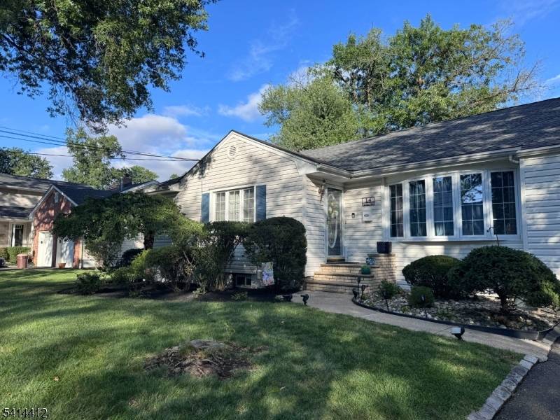 Gracefully positioned on a quiet circular street, this classic split level residence offers privacy, timeless design, and a sense of neighborhood charm rarely found.