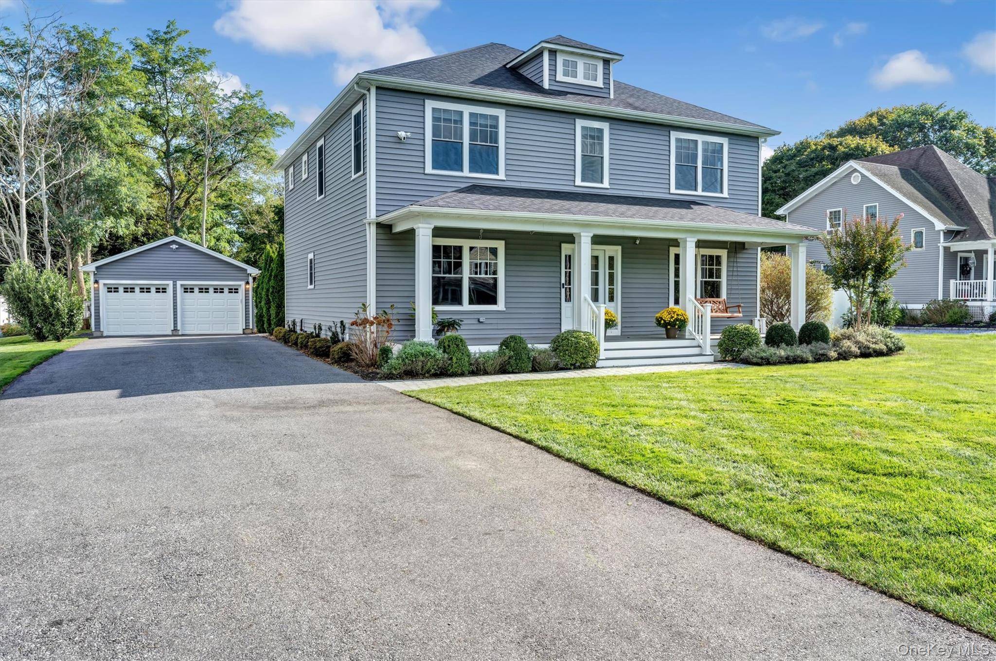 Serenity Meets Sophistication in East Moriches Discover timeless elegance and modern comfort in this impeccably maintained Colonial home at 14 Culver Lane, East Moriches.