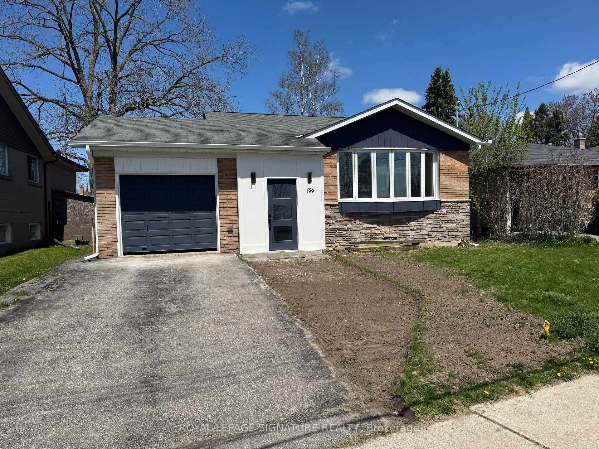 Welcome to this beautifully renovated 4 bedroom 2 bathroom bungalow nestled in the Guildwood community.