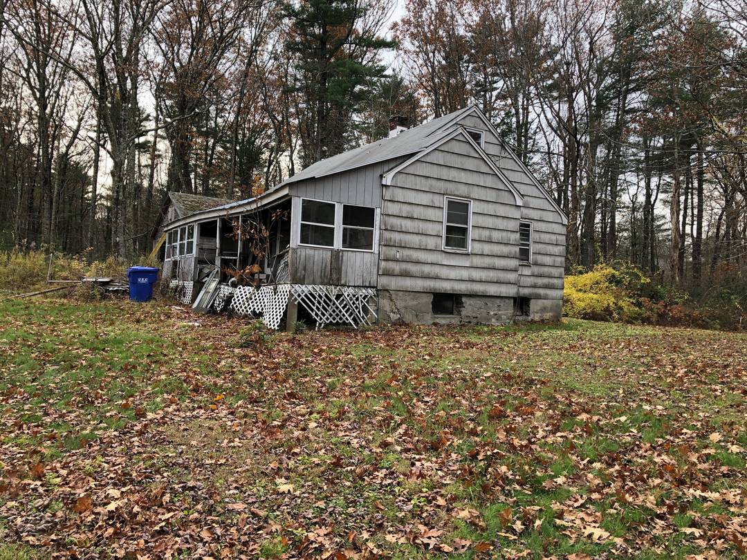 Unique property with 149 acres, open meadow, abundant standing softwoods and hardwoods, old logging roads, hiking trails, a brook and frontage on 3 roads.