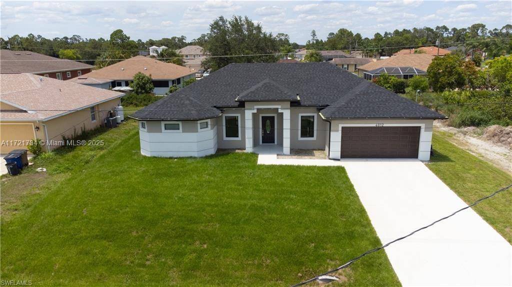 This new construction in Lehigh Acres, just a few blocks from Lee Ave, offers a strategic location near schools, a public library, and essential services.
