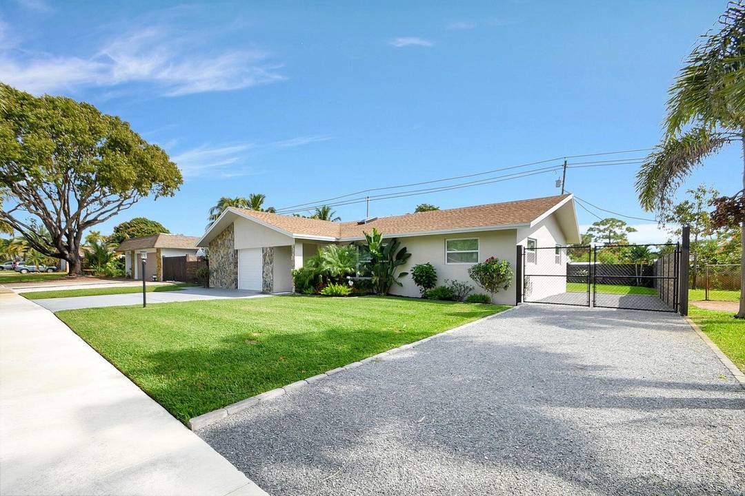 Beautifully furnished and completely renovated 3 bedroom, 2 bath Pool Home with garage near Lake Osborne In Lake Worth Beach available for Month to Month lease.