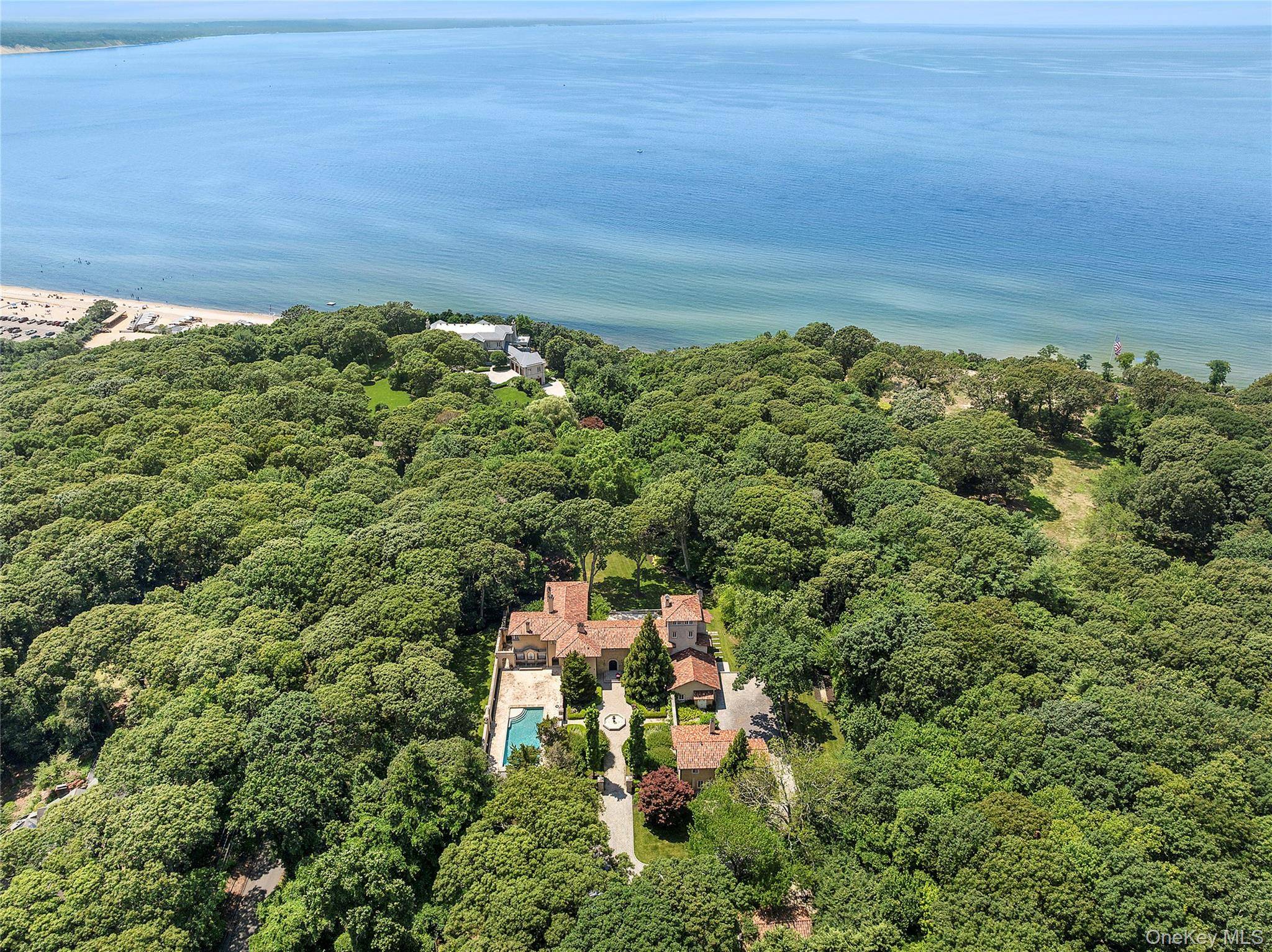 Exquisite Tuscan Inspired Estate Just Steps from the Beach.