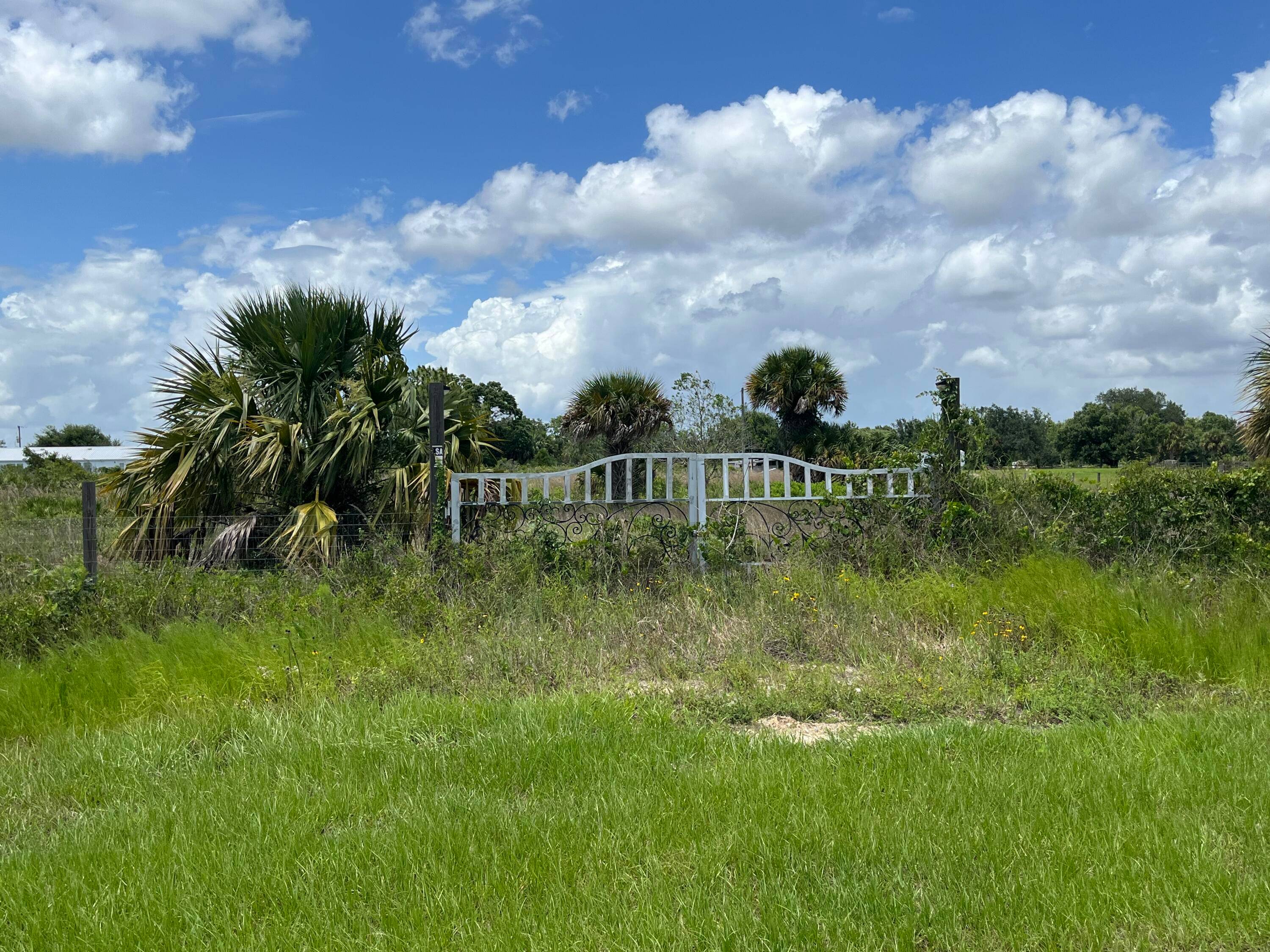 Build or bring your dream home and barn on this beautiful 1.