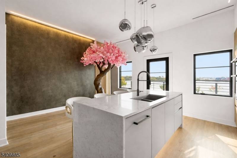 Stunning, modern waterfront living with designer finishes throughout.