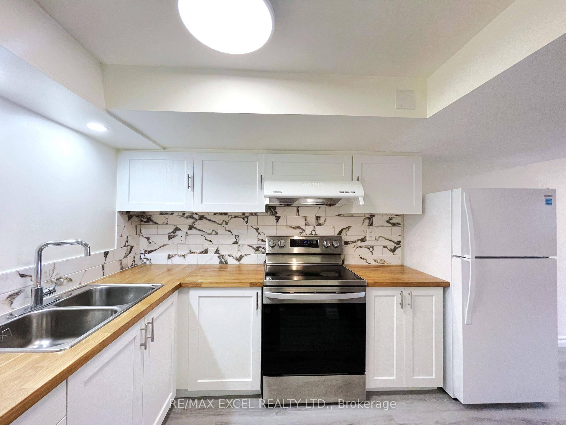 Welcome To This Bright amp ; Spacious 2 Bed, 1 Bath Walkout Basement Unit Located In The Sought After Neighborhood of Heartland in Mississauga !